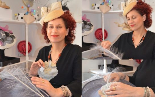 Mary Spiteri, owner of Tit fer Tat Boutique, poses with some of her hat creations