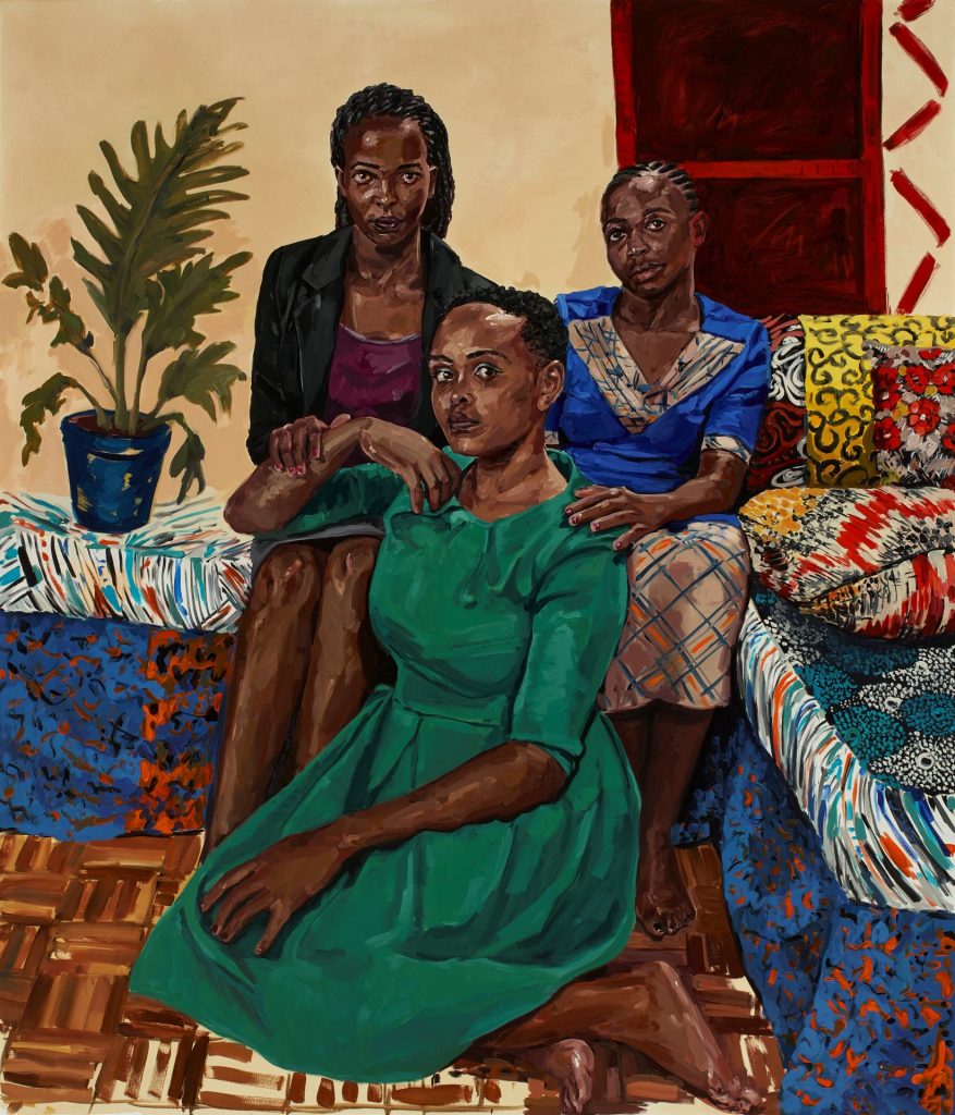 Wangari Mathenge's painting of three Kenyan domestic workers. Two are sat on a sofa and another on the floor resting her arm on the knees of one of the others. All have serious expressions