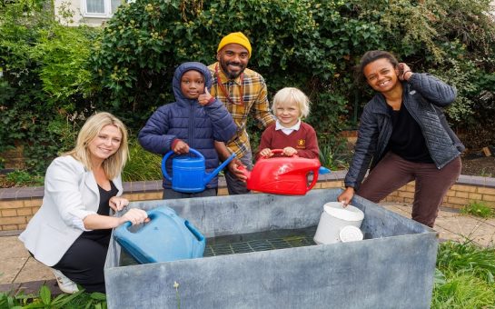 Children from Chesterton Primary School in Battersea try out the dipping pond in its new home on the roof garden on the Doddington estate in Battersea left to right: Jo McDonagh, London Square, teacher Edress Kheir and Malissa Ritchie, chair of volunteers for the Doddington garden