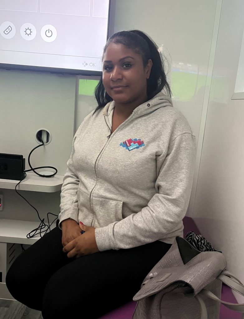 Jade Blake sits inside the new Wandworth mobile youth centre