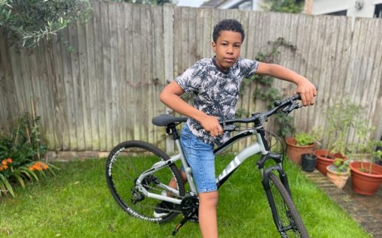 Childhood Cancer survivor Jasper Lilley on his bicycle