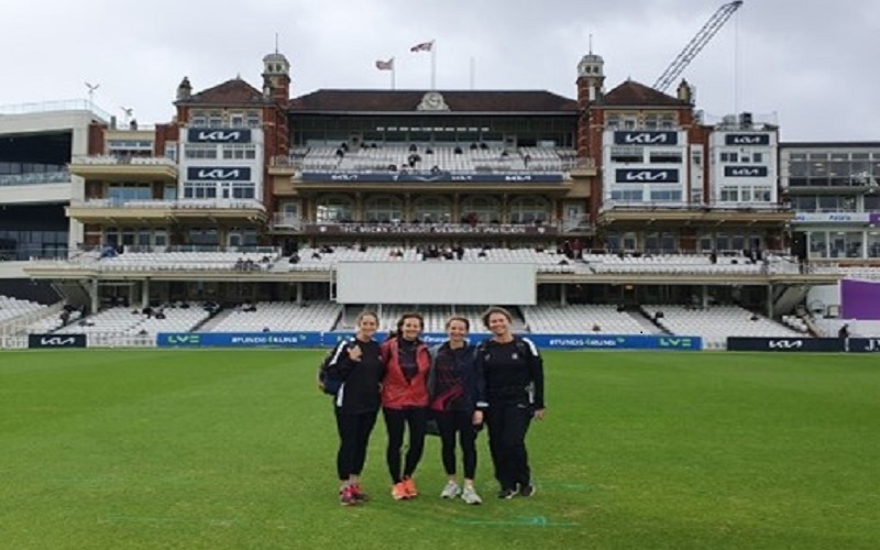 4 women standing in front of The Oval in Kingston