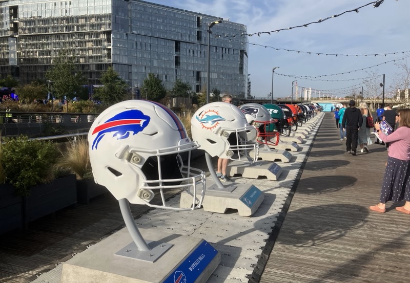 A row of Giant replica NFL helmets at NFL Experience London