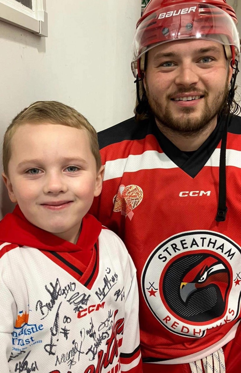 Mickey Pickett with is favourite Streatham Redhawks player, Ben Paynter
