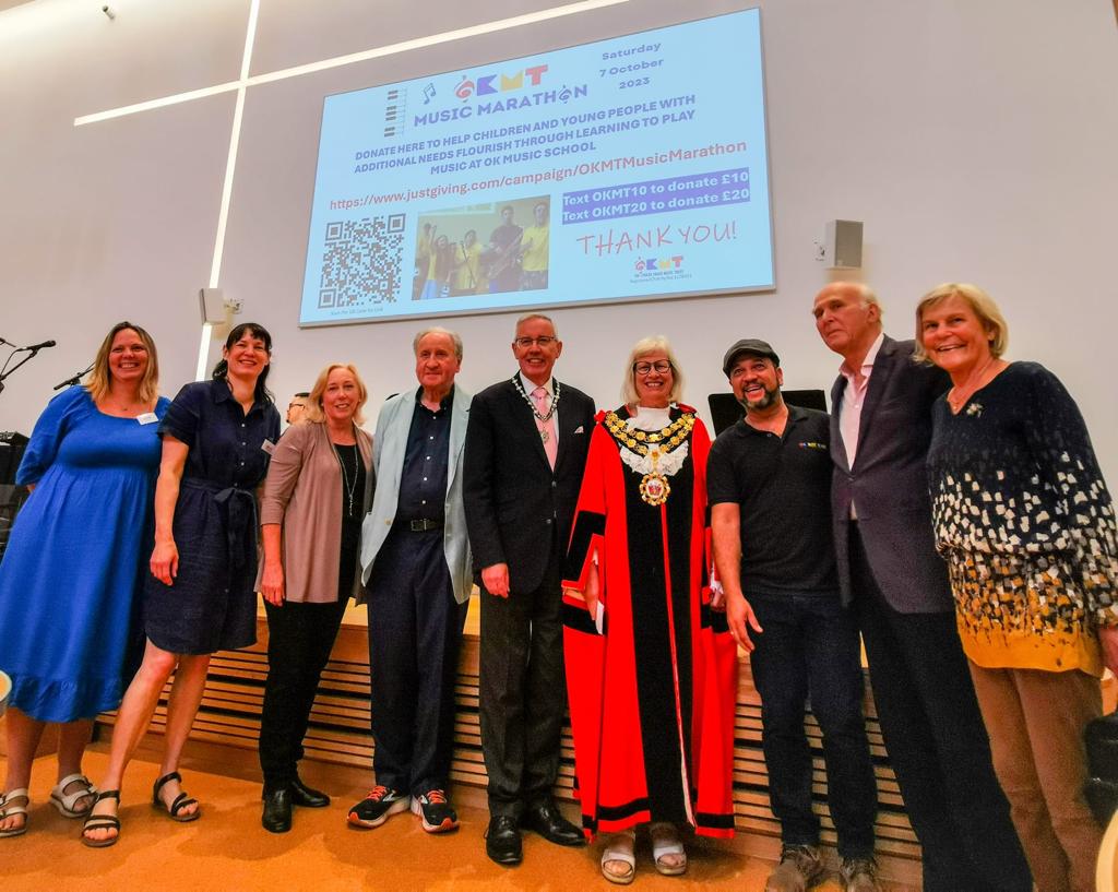 OKMT Trustee Laura Plail, OKMT Director Clare Lawrence, Cllr Nancy Baldwin, Lord Lee of Trafford, Professor John Nicholson, Mayor of LBRuT Cllr Suzette Nicholson, OK Music School Director Edison Carolino, Sir Vincent Cable and Rachel Smith taking a group picture