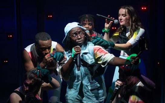 Performers of 'Pied Piper' on-stage mid-performance