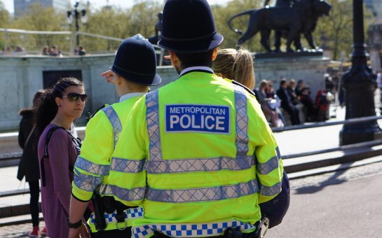 Photo of the back of a Metropolitan Police officer.