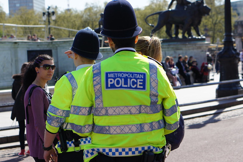 Photo of the back of a Metropolitan Police officer.