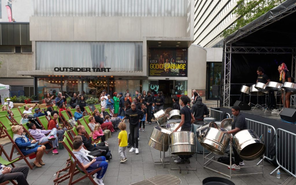 New Generation Urban Fox Orchestra Steelband performing on stage at Lyric Square market, Hammersmith, on 30 September