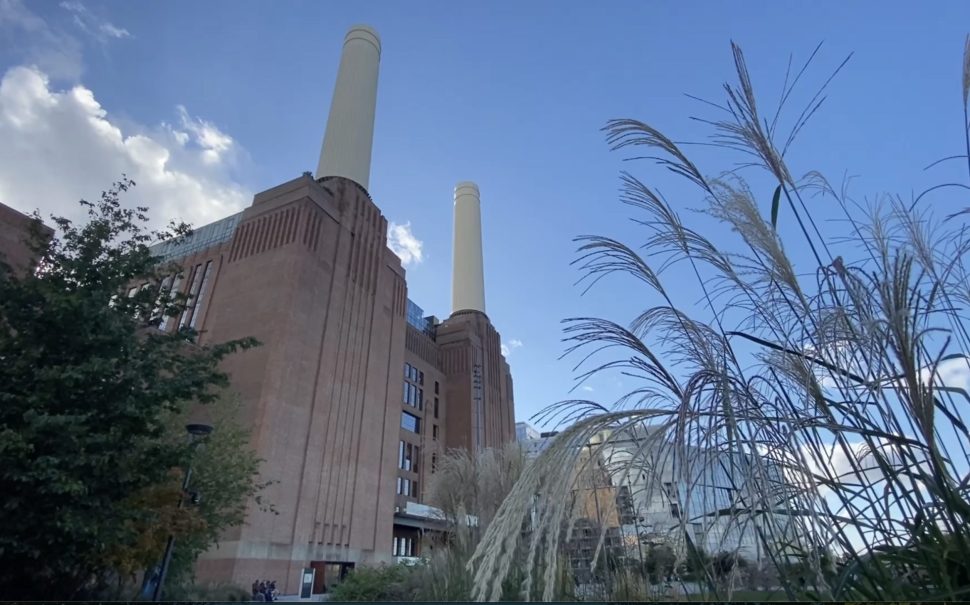 Battersea Power Station on a blue sky autumn day.