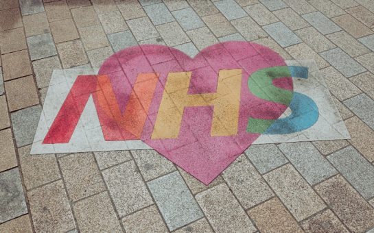 Banner on floor with NHS written across a pink heart