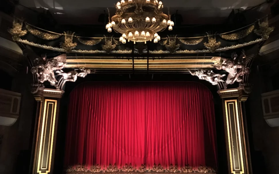 Red curtain closed at theatre