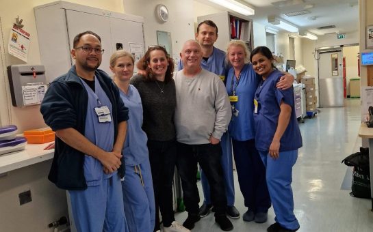 Nicky and Andrew Hayward, centre, with staff from St Helier's intensive care unit