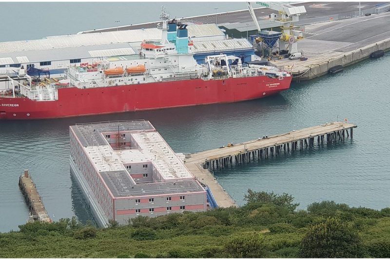 Long-shot image of Bibby Stockholm barge in Portland Pier