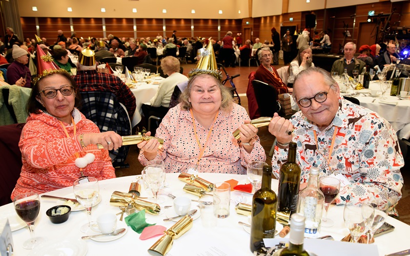 Elderly residents celebrating at Christmas lunch
