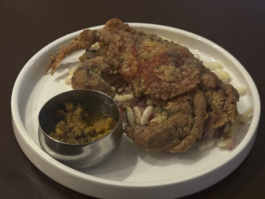 aachari kekda, softshell crab deep fried served with indian pickle.