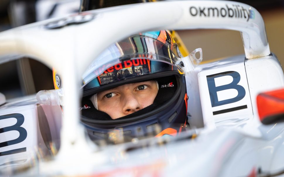 Goethe sitting in his f3 car with his visor up