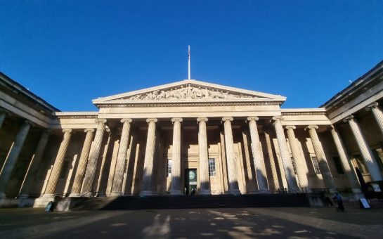 The facade of the British Museum in the morning winter sun.