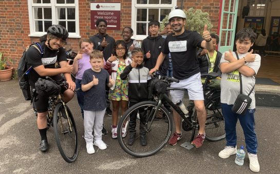 Groups photo of children attending the HAF provision at Rugby Portobello Trust in Summer 2023