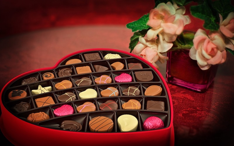 Image of Valentine's Day box of chocolates and flowers
