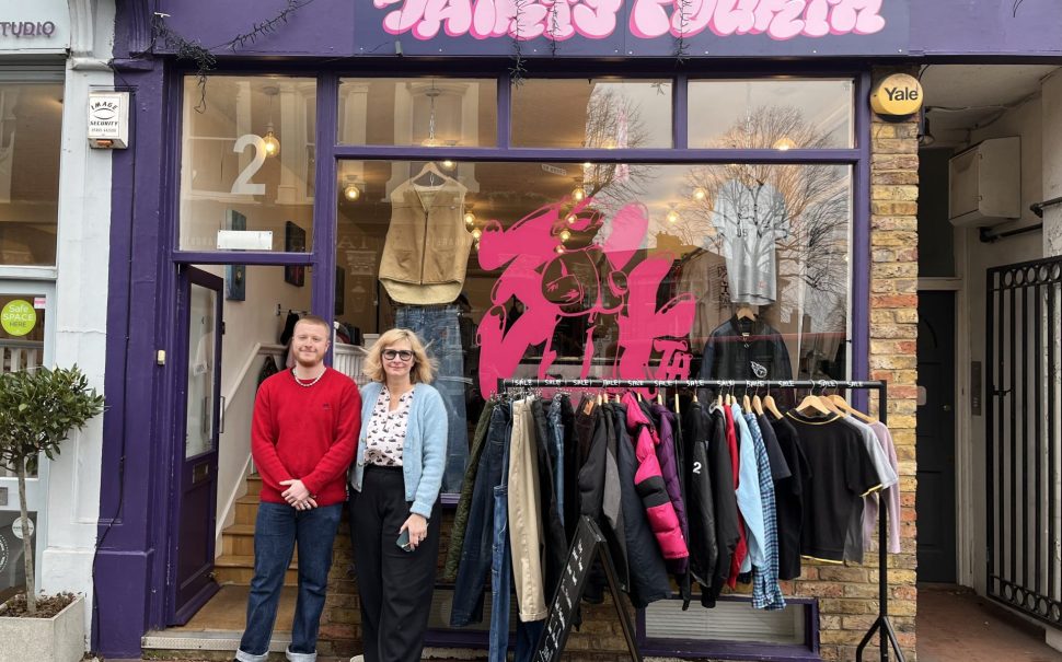 Man and woman outside shop front