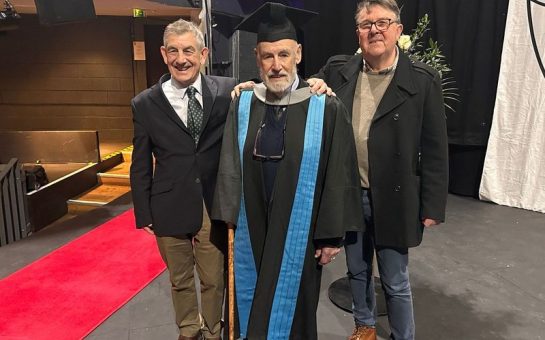 Dr Marjot accompanied by his son and son-in-law on his graduation day