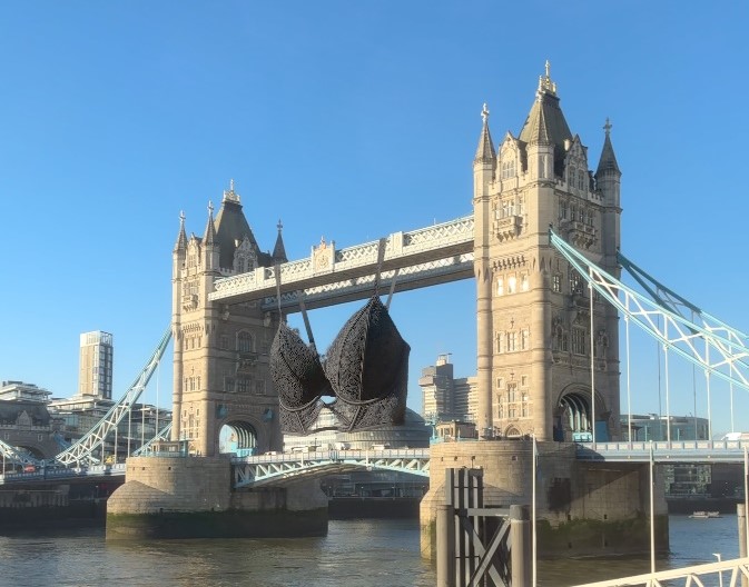Picture of London Bridge with a giant CGI bra hanging from the top of the bridge