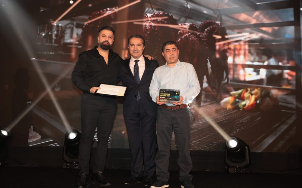 Winner of Chef of the Year at The British Kebab Awards, Mazlum Demir poses with his award.