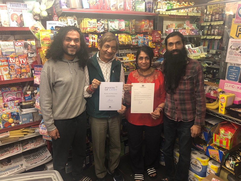 The Patel family with their award