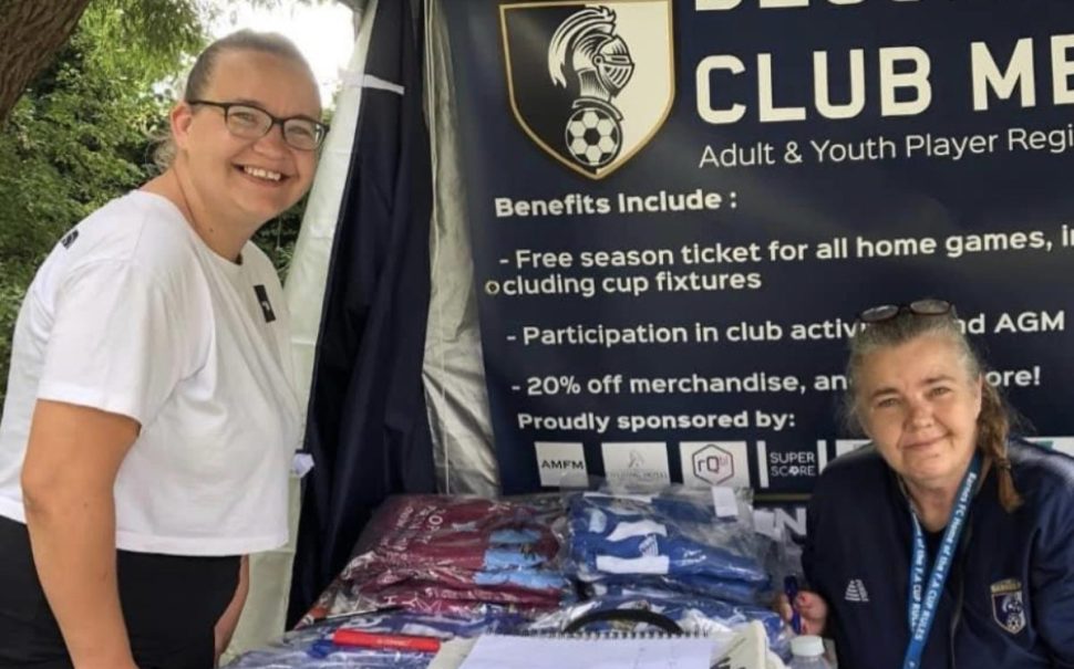 Julie Burgess with the Club Merchandise at last year's community day.