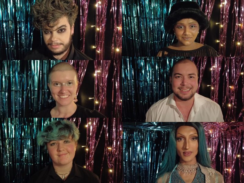 Trans and non binary performers stand in front of the trans flag colours of Trans Day of Visibility at the Oval Tavern in Croydon