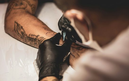 Person's wrist being tattoed