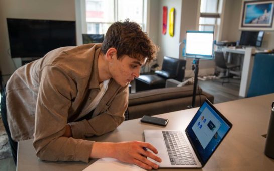 Young man working at an office desk