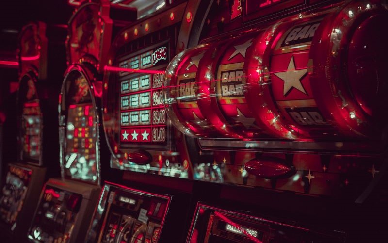 Three casino games, in red lighting