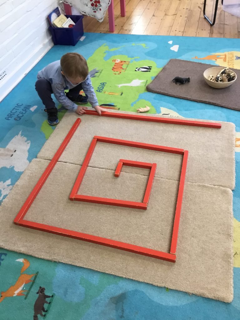 A child playing at nursery