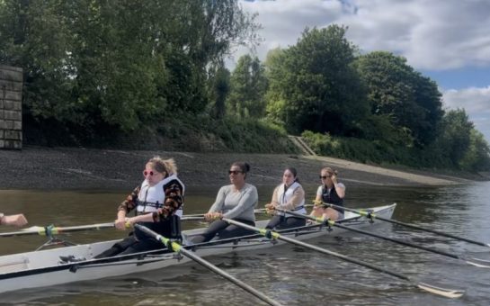 Four visually impaired rowers on the Thames.
