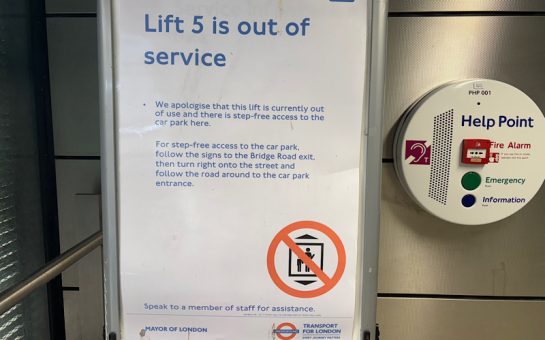 A Transport for London lift out of service sign.