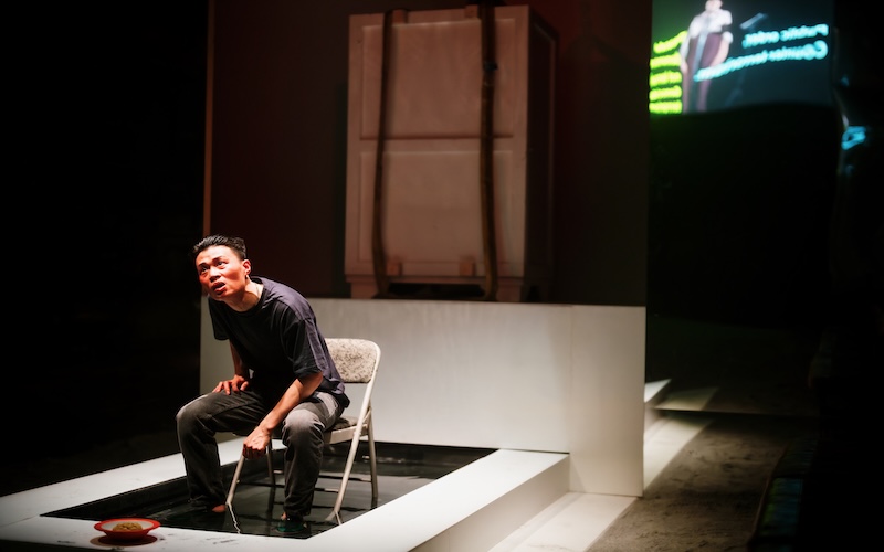 Aiden Cheng as a political prisoner in Joel Tan's 'Scenes from a Repatriation' (Picture credit: Alex Brenner)