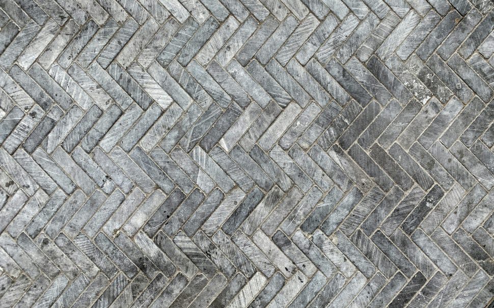 Herringbone tile pattern on floor (Credit: Free to use from Unsplash)