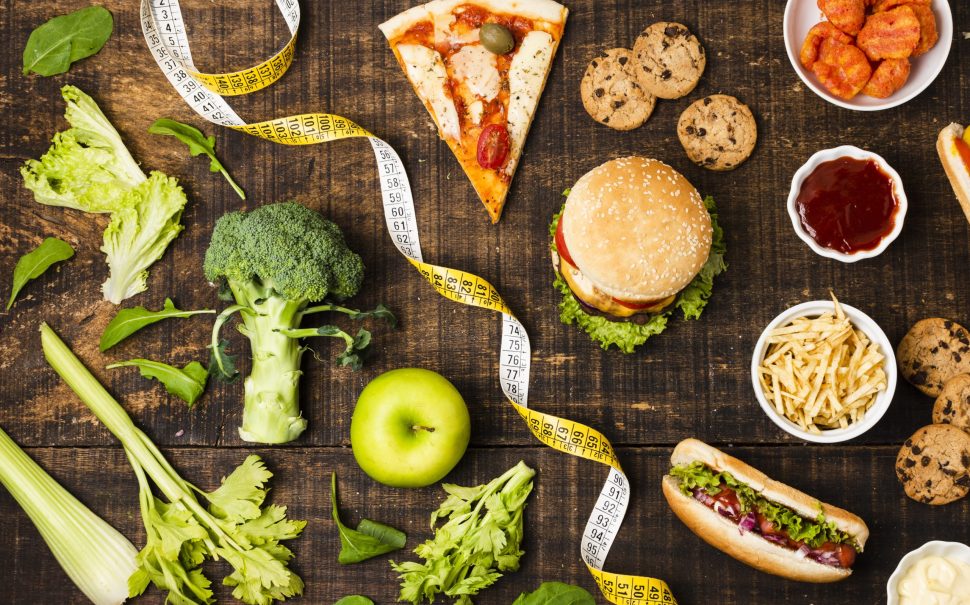 Healthy and junk food (Credit: Free to use from Freepik)