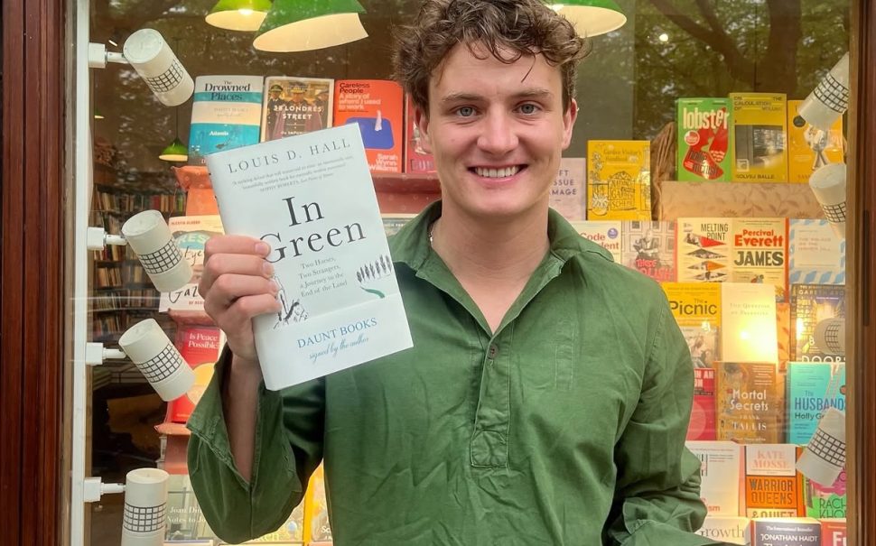 Louis Hall, posing outside Daunt Books at his launch.