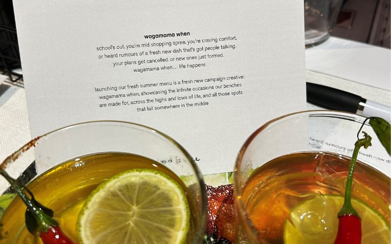 A picture of two margaritas and a promotional handout about the new wagamama menu.