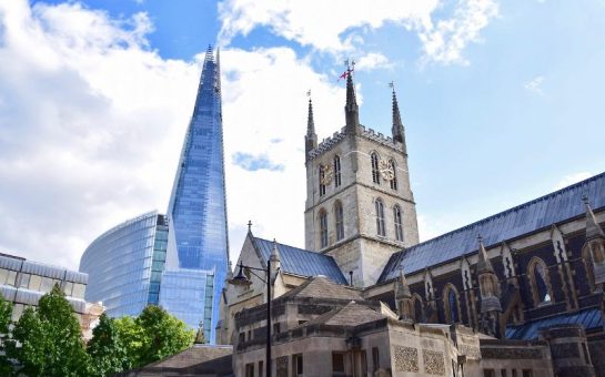 Borough Market photographed in daytime with The Shard in the backdrop.