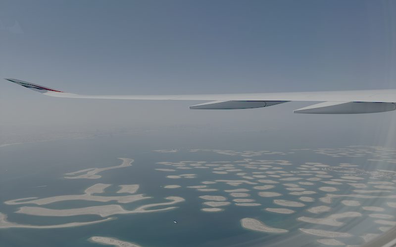 View from airplane window over the sea and islands