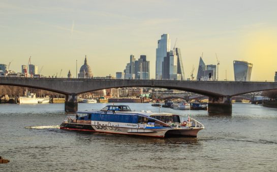 Photo of an Uber Boat on the Thames River.