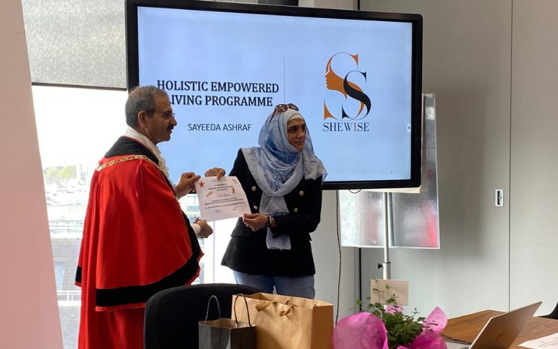 A photo of a SHEWISE ceremony.