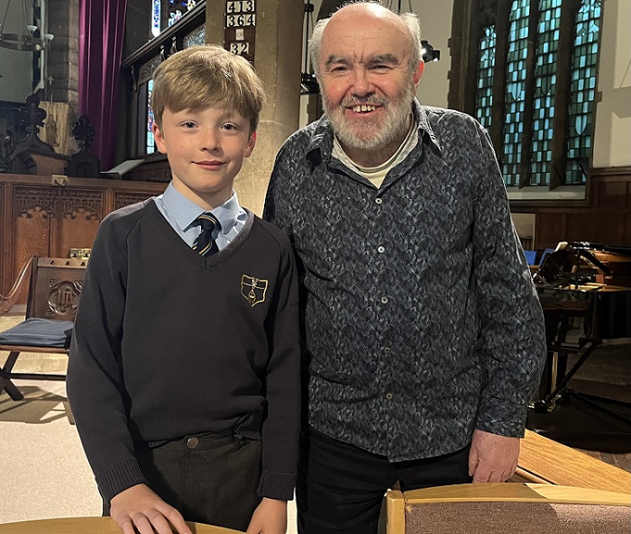 SWP supporters, Gabriel, 10, a local school boy (Left) and Andy Hamilton , writer and comedian (right).