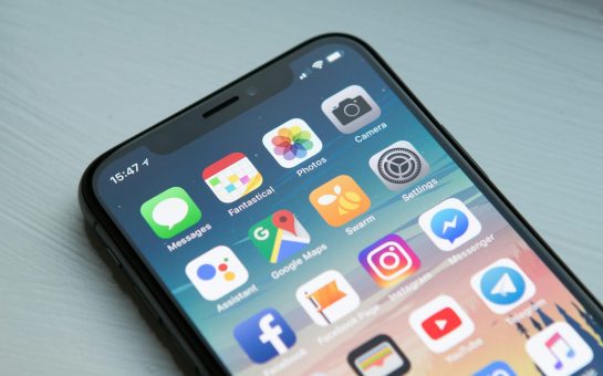 Smartphone screen showing a list of apps (Credit: Free to use from Unsplash)