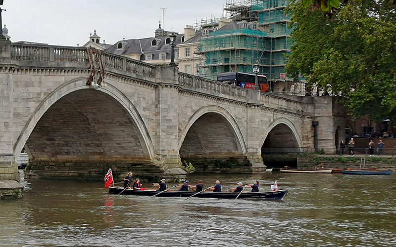 Cutter Trinity Tide rowing under Richmond Bridge