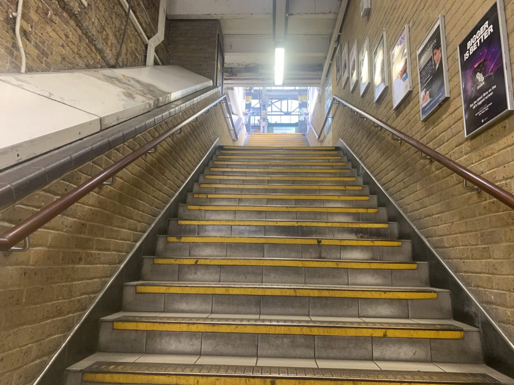 Two of the three flights of long stairs at Putney Station